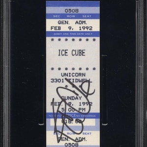 May include: A concert ticket from the 1992 Ice Cube "Steady Mobbin'" tour at The Unicorn in Houston, TX. The ticket is dated February 9, 1992, and includes the venue, time, and price of $18.00. The ticket is encased in a protective holder.