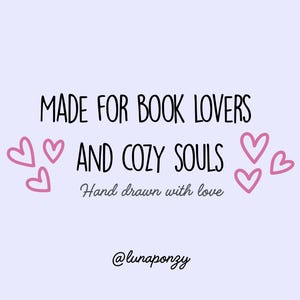 May include: A light purple background with the text "MADE FOR BOOK LOVERS AND COZY SOULS" in black. Pink hearts are scattered around the text. The phrase "Hand drawn with love" is below the main text.