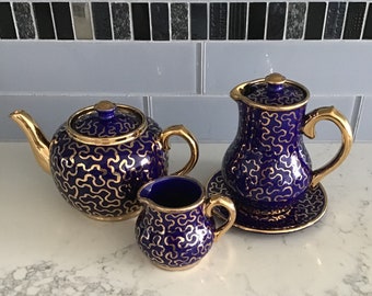 SUDLOWS BURSLEM TEAPOT, Pitcher, Creamer and Plate.  Cobalt and Gold. Ca. 1920-1940.  Bone China. Made in England