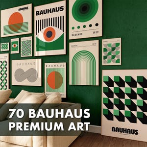 May include: A collection of 70 Bauhaus-style art prints in a variety of geometric designs and colors, including green, orange, and black. The prints are displayed on a green wall with a couch in the foreground.