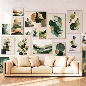 May include: A collection of framed wall art featuring abstract designs in shades of green, gold, and beige. The artwork includes depictions of faces, landscapes, and geometric shapes. The art is displayed above a beige sofa with several pillows.
