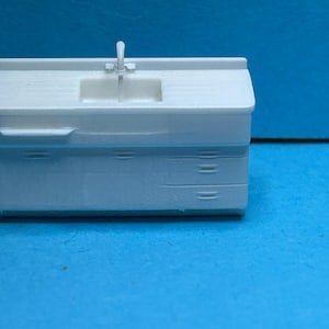 3D resin printed HO scale 1:87 1940s kitchen sink cabinet; white resin. Also made in S and O scale too