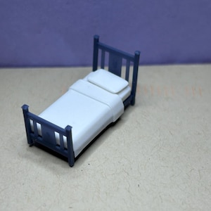 3D resin printed HO scale 1:87 twin size bed frame, wood slat head and foot board, mattress with blanket, 1 pillow kit; white and gray.