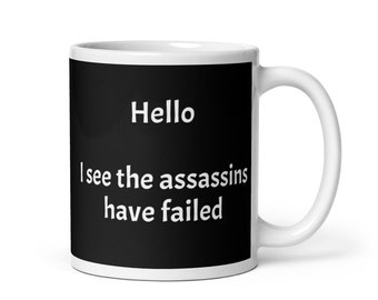 Hello I see the assassins have failed coffee mug