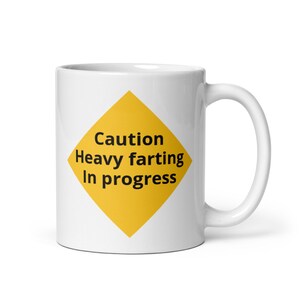 Caution heavy farting in progress coffee mug
