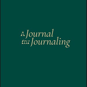 May include: A dark green journal cover with the text "A Journal for Journaling" in a light beige font.