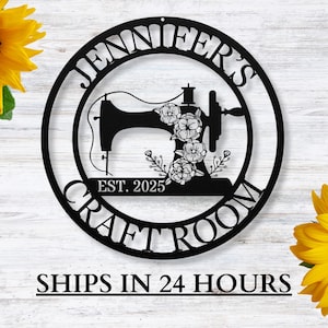 May include: Black metal craft room sign with the text "JENNIFER'S CRAFT ROOM" in a circular design. A sewing machine silhouette is in the center, with floral accents and the text "EST. 2025".