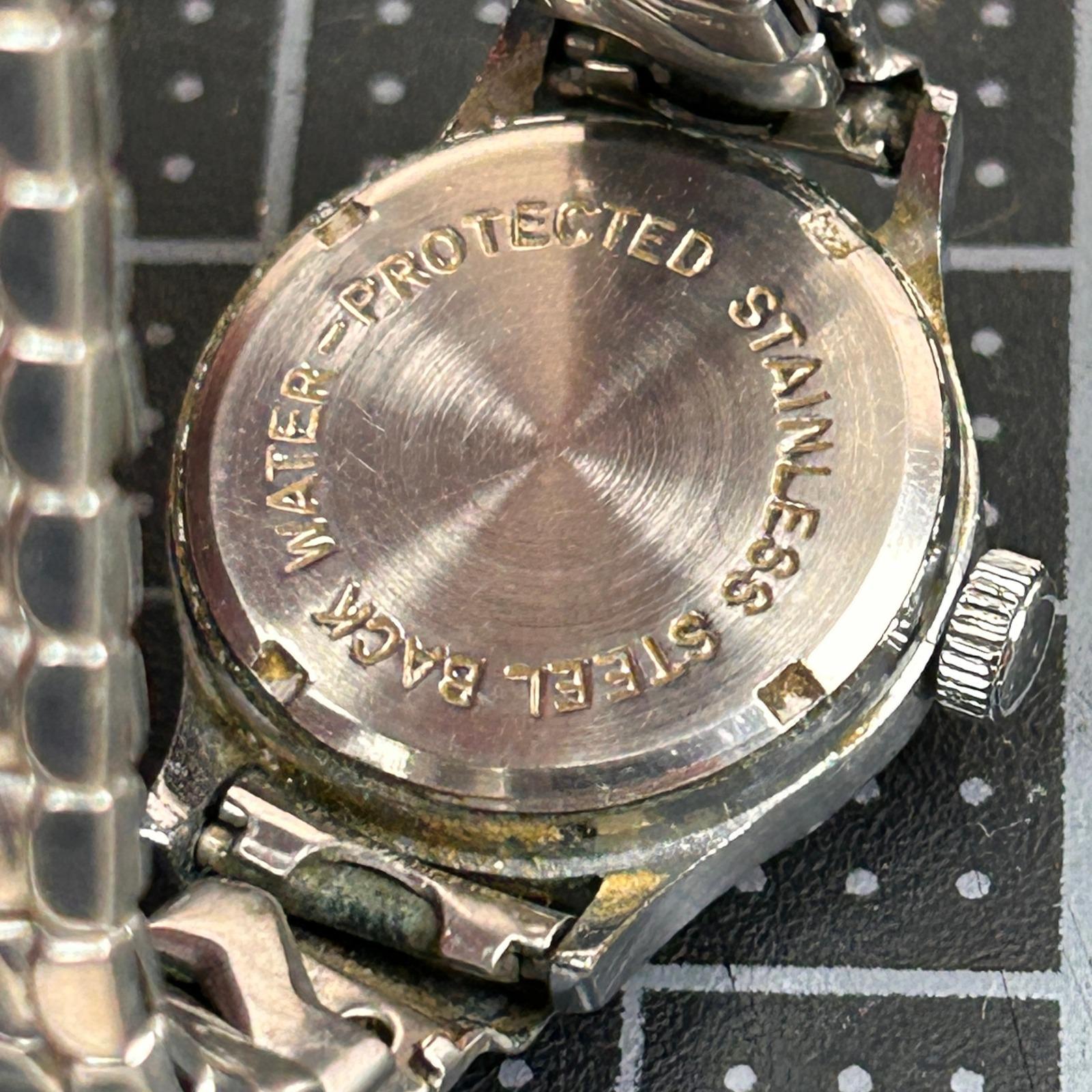 Vintage Buren Watch Silver Tone Cream Dial Arabic Numerals Expansion Band Tested Buren Stainless Steel Band Wristwatches for sale | eBay main image 4