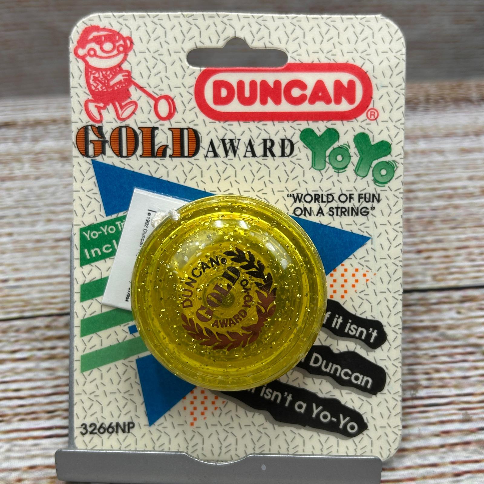 Vintage Duncan Butterfly Yo-Yo Orange and Green Gold Text Made In USA Yo Yo Yoyo