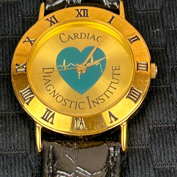 Athenee Du Geneve Cardiac Diagnostic Institute 18k Gold  display picture 1