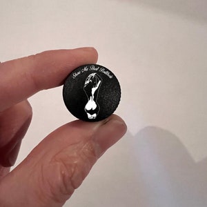 Harley custom Show Me That Butthole seat bolt