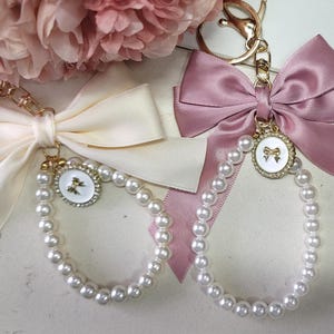 Pearl and Bow Keychain | Pearl Wristlet | Bow Keychain | Elegant Keychain | Women&#39;s Keychain | Chic Keychain | Bag Charm | Purse Charm