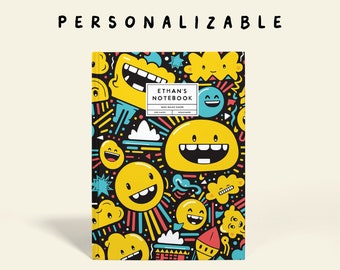 May include: A black notebook cover with a colorful pattern of smiling faces, stars, and clouds. The text "ETHAN'S NOTEBOOK" is printed in white on a blue rectangle in the center of the cover.