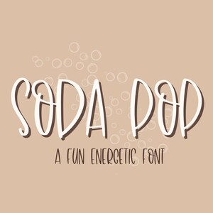 May include: A digital graphic with the words "SODA POP" in a white, playful font with a brown shadow, and the text "A FUN ENERGETIC FONT" in a smaller, brown font. The background is a light brown color with white bubble graphics.