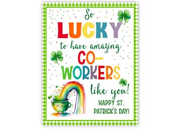 May include: A green and white card with a rainbow, pot of gold, and shamrocks. The text reads "So LUCKY to have amazing CO-WORKERS like you! HAPPY ST. PATRICK'S DAY!"