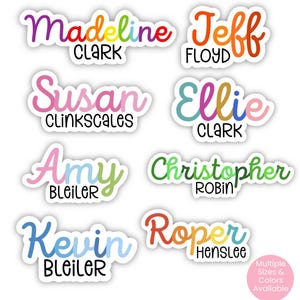 May include: Vinyl school supply labels featuring various names in colorful, cursive fonts with black printed surnames below. The names include Madeline Clark, Jeff Floyd, Susan Clinkscales, Ellie Clark, Amy Bleiler, Christopher Robin, Kevin Bleiler, and Roper Henslee.