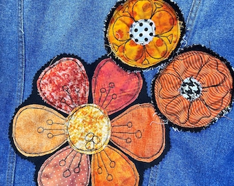 Upcycled jacket, denim patches, shabby chic, decorated jean jacket, repurposed jacket, shabby patches, orange and black, flower power