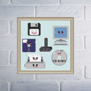 May include: A set of six pixelated computer icons with cute faces. The icons include a floppy disk, a computer monitor, a joystick, a printer, a CD-ROM, and a floppy disk. The icons are all in different colors and have a retro look.