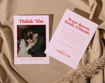 May include: A pink and white thank you card with a photo of a couple in a red frame. The text on the card reads "Thank You" and "To our dearest family & friends". The card also includes the text "Love, The Millers" and "With love, Paloma & Jake".