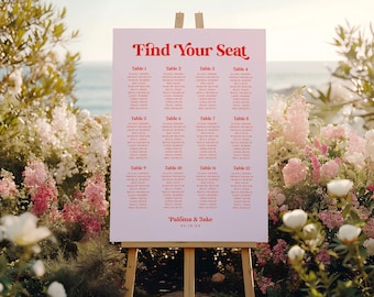 May include: A pink wedding seating chart with the text "Find Your Seat" in red. The chart lists tables 1 through 12 with guest names. The bottom of the chart reads "Palóma & Jake" in red.