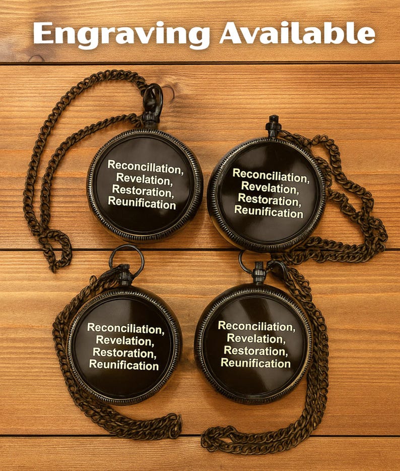 May include: Four round black pocket watches with attached chains. Each watch face features the white text: Reconciliation, Revelation, Restoration, Reunification. The text Engraving Available appears at the top of the image.