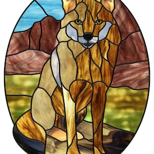 May include: A stained glass depiction of a brown wolf sitting on a rock with a desert landscape in the background.