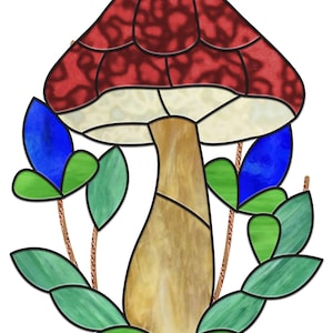 May include: A stained glass mushroom with a red cap and a brown stem surrounded by blue and green leaves.