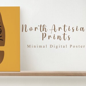 May include: A minimalist digital poster with a mustard yellow background. A brown footprint shape is centered, with the name "ANDY" in black script. The text "North Artisian Prints" and "Minimal Digital Poster" are also visible.