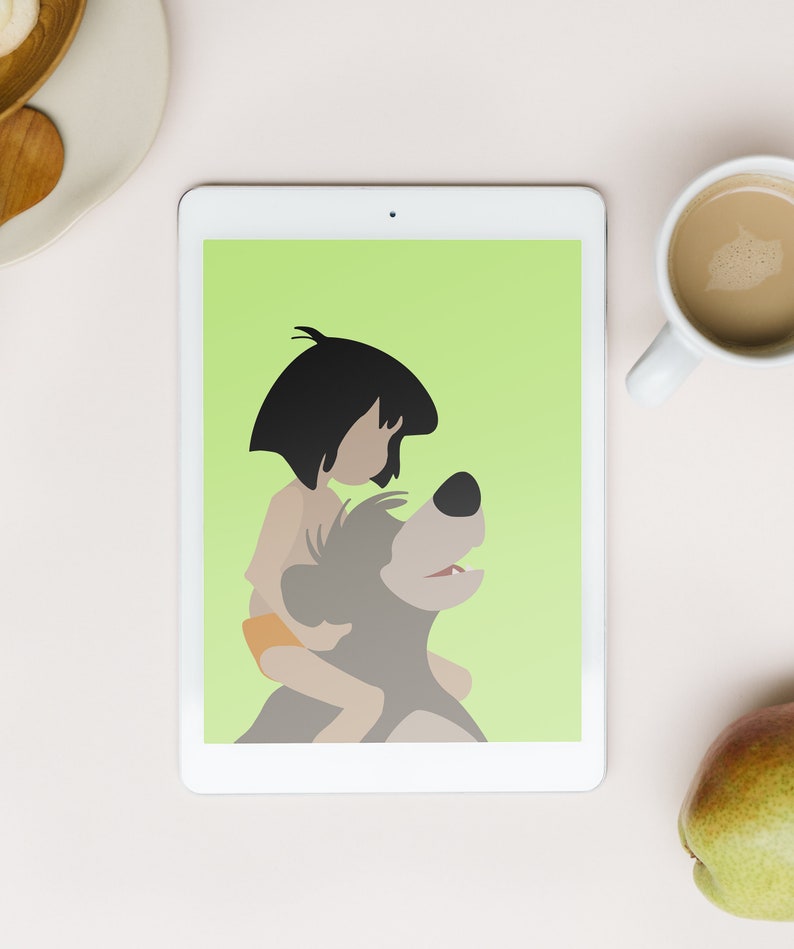 Puede incluir: Una tableta blanca con una pantalla verde que muestra una imagen de dibujos animados de un ni&ntilde;o montando un oso. El ni&ntilde;o lleva un taparrabos marr&oacute;n y tiene el pelo negro. El oso es marr&oacute;n y tiene un hocico blanco.