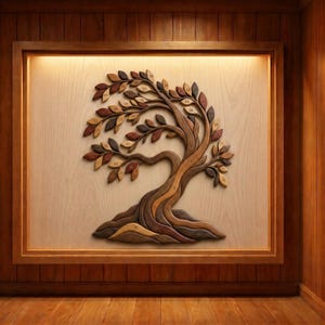 May include: A wooden tree sculpture with numbered leaves, framed in a wooden shadow box. The tree features a detailed design with various shades of brown and tan, creating a three-dimensional effect. The background is a light wood panel.
