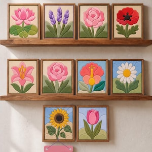 May include: Ten framed Kinusaiga art pieces featuring floral designs including a lotus, lavender, rose, poppy, lily, hibiscus, daisy, sunflower, and tulip. The text reads Beginner Kinusaiga Patterns! and 10 Printable Flower Bundle on a hanging sign.