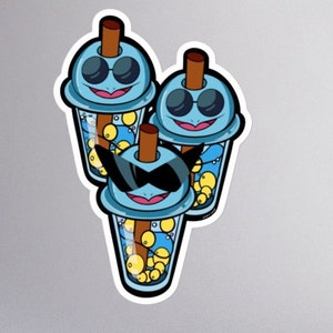May include: A sticker featuring three cartoon bubble tea drinks with blue cups, brown straws, and smiling faces. Two of the drinks wear sunglasses. The drinks are filled with yellow boba pearls and ice.