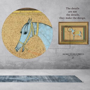 May include: A close-up of a blue horse's head with a yellow bridle and orange reins. The horse is depicted in a traditional Indian miniature painting style. The text "The details are not the details, they make the design." is displayed above the image.