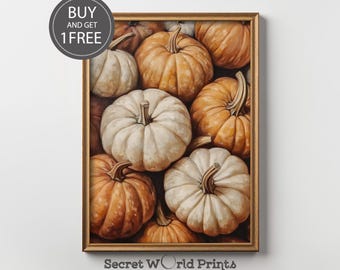 Puede incluir: Una impresión enmarcada que presenta una colección de calabazas en tonos naranja y blanco. Las calabazas están muy juntas, creando una composición texturizada y visualmente atractiva. La impresión incluye el texto "BUY AND GET 1 FREE" y "Secret World Prints".