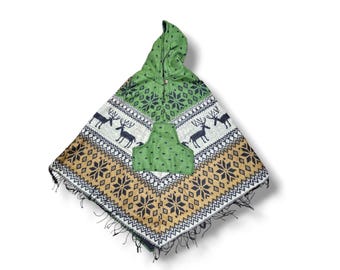 May include: A green and brown hooded poncho with a reindeer pattern. The poncho has a large pocket on the front.