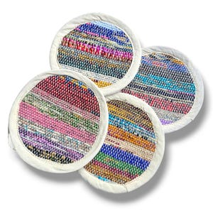 May include: Four colorful woven coasters with white fabric edging. The coasters feature a variety of colors and patterns, including pink, blue, green, yellow, and red.