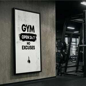 May include: Black and white motivational poster with the text "GYM OPEN 24/7 NO EXCUSES" on a white background with a black brushstroke behind the text "OPEN 24/7".