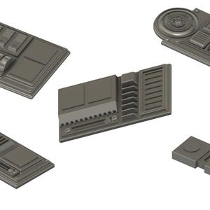 May include: Five different grey plastic panels with various buttons, knobs, and switches. These panels are designed for model building and crafting.