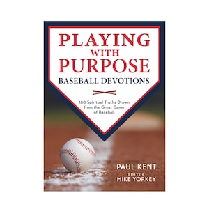 May include: Book cover with a baseball on a baseball field. The title is "Playing with Purpose: Baseball Devotions". The subtitle is "180 Spiritual Truths Drawn from the Great Game of Baseball". The author is Paul Kent, Editor, and Mike Yorkey.