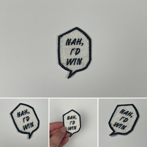 May include: Embroidered patch in the shape of a speech bubble with the words "Nah, I'd Win" in black script. The patch has a white background and a black border. The patch is a fun accessory for clothing or bags.