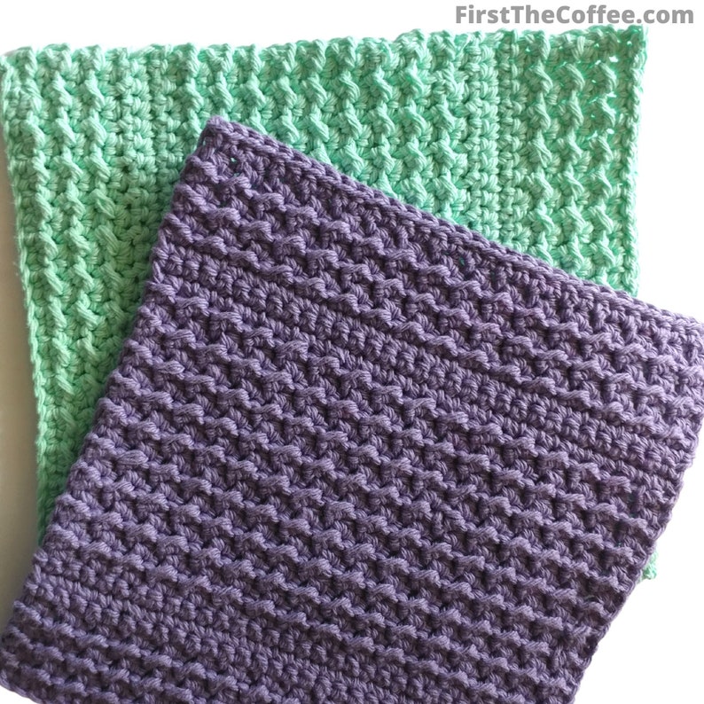 May include: Two crocheted dishcloths, one in a light green color and one in a purple color. Both dishcloths have a textured pattern.