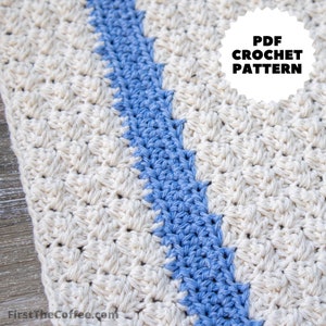 May include: A crochet pattern featuring a white crochet fabric with a blue stripe down the center. The pattern is available as a PDF download.