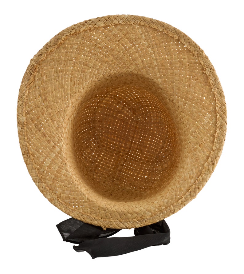 May include: A straw hat with a black ribbon tied around the crown. The hat is made of woven straw and has a wide brim.