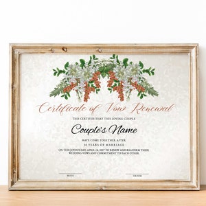 May include: A certificate of vow renewal with a floral design. The text reads "Certificate of Vow Renewal" and "This certifies that this loving couple [Couple's Name] have come together after 30 years of marriage on the joyous date April 18, 2017 to renew and reaffirm their wedding vows and commitment to each other."