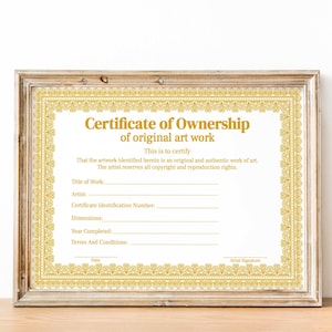 May include: A certificate of ownership for original artwork with a gold border and ornate design. The certificate includes fields for the title of the work, artist, certificate identification number, dimensions, year completed, terms and conditions, date, and artist signature.