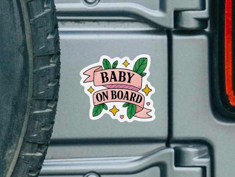 Vinyl Baby On Board decal sticker shown on a smooth SUV surface