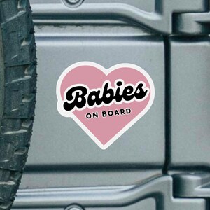 Size reference for baby on board sign on back of car