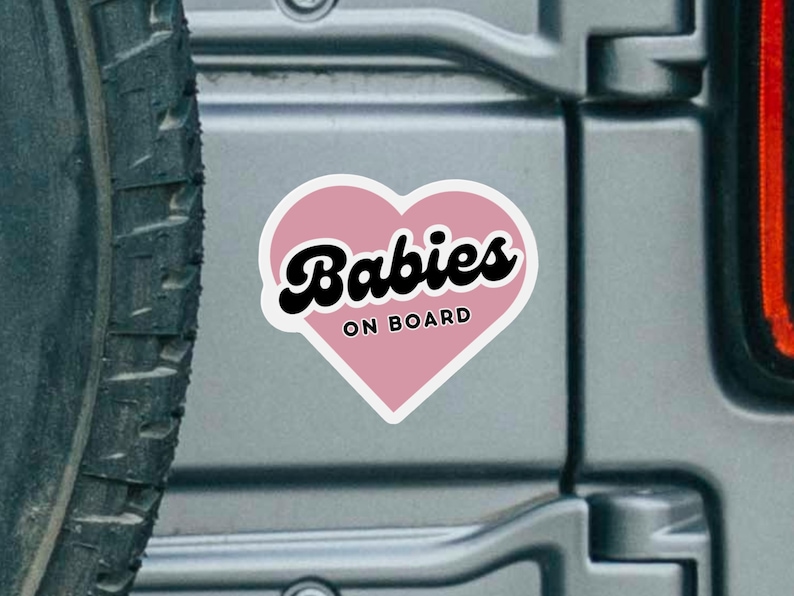 Size reference for baby on board sign on back of car