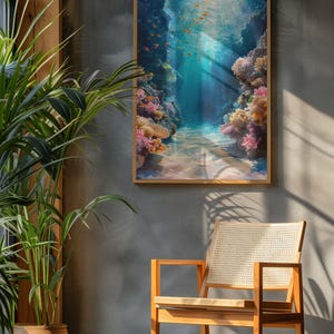 This marine life wall art printable showcases the underwater seascape. A school of deep-sea fish moves around, while bright coral reefs in the surroundings add to the scene's charm. This print will look great in homes with modern or minimalist décor.