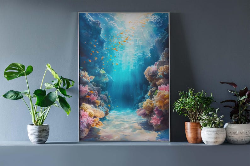 This marine life wall art printable showcases the underwater seascape. A school of deep-sea fish moves around, while bright coral reefs in the surroundings add to the scene's charm. This print will look great in homes with modern or minimalist décor.